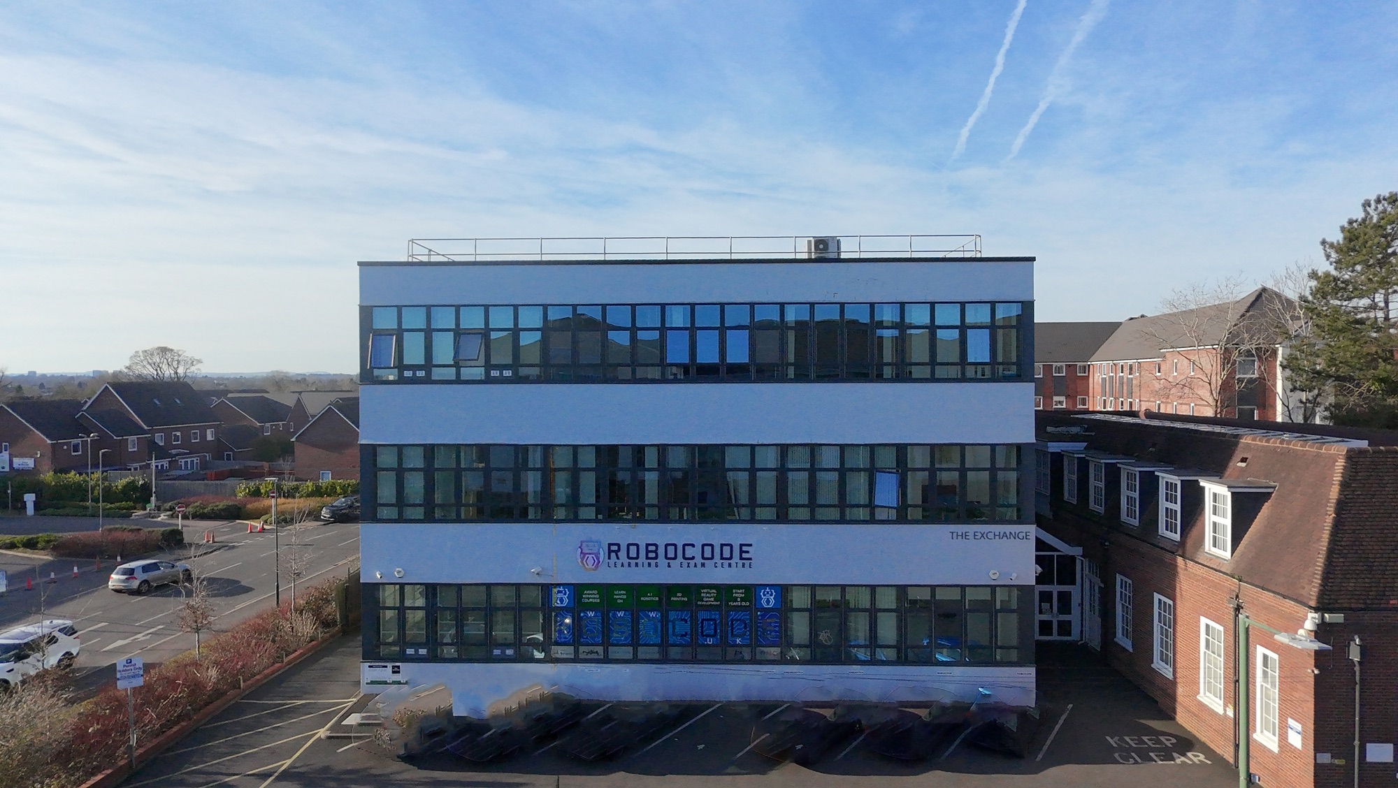The Exchange building, Shirley, aerial view showing the Robocode Learning & Exam Centre signage.