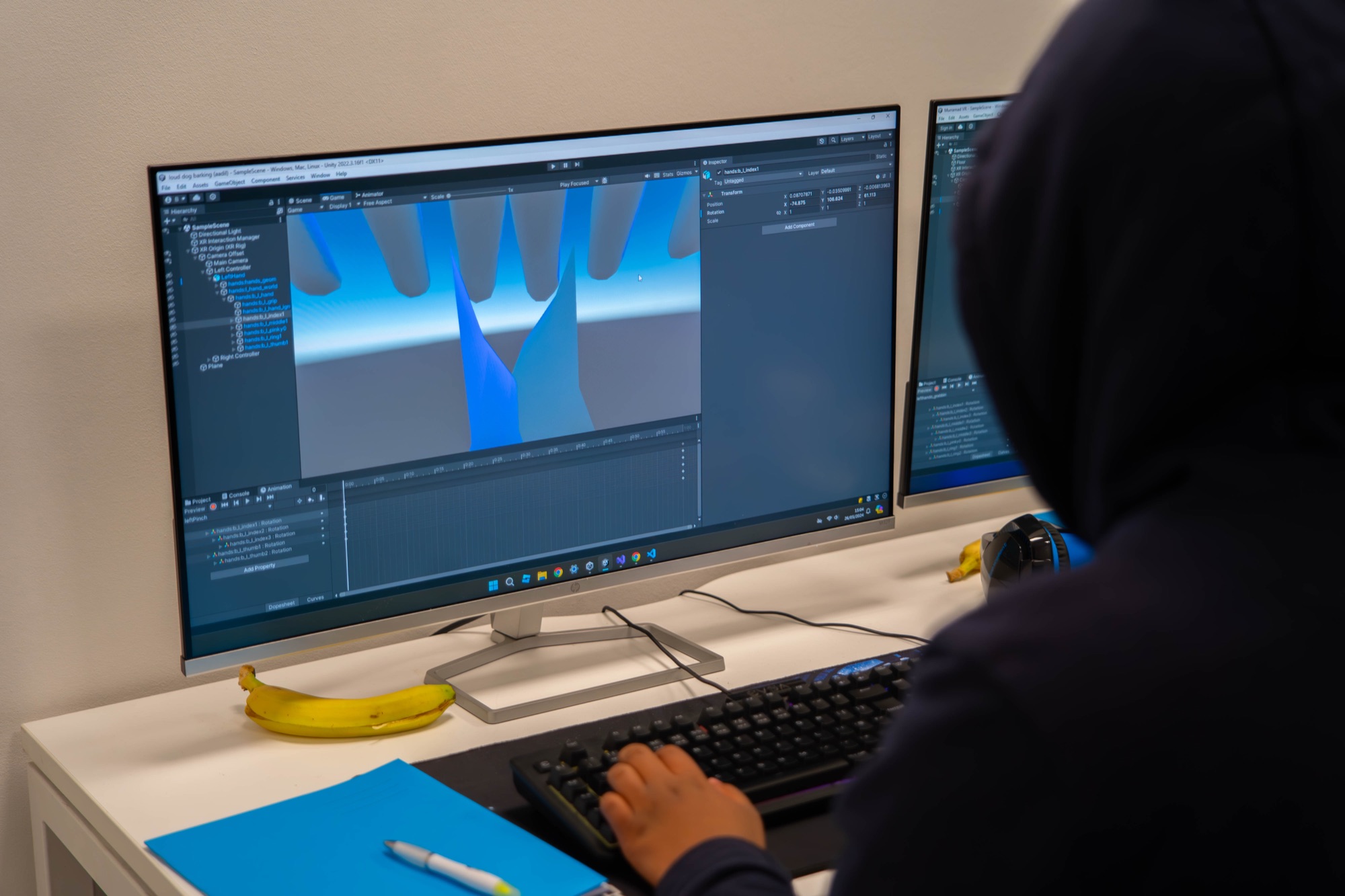 Unity scene with a 3D hand rig, a Game Development course portfolio piece.